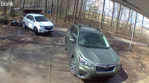 Reversing Car Backs Into Parked Motorcycle