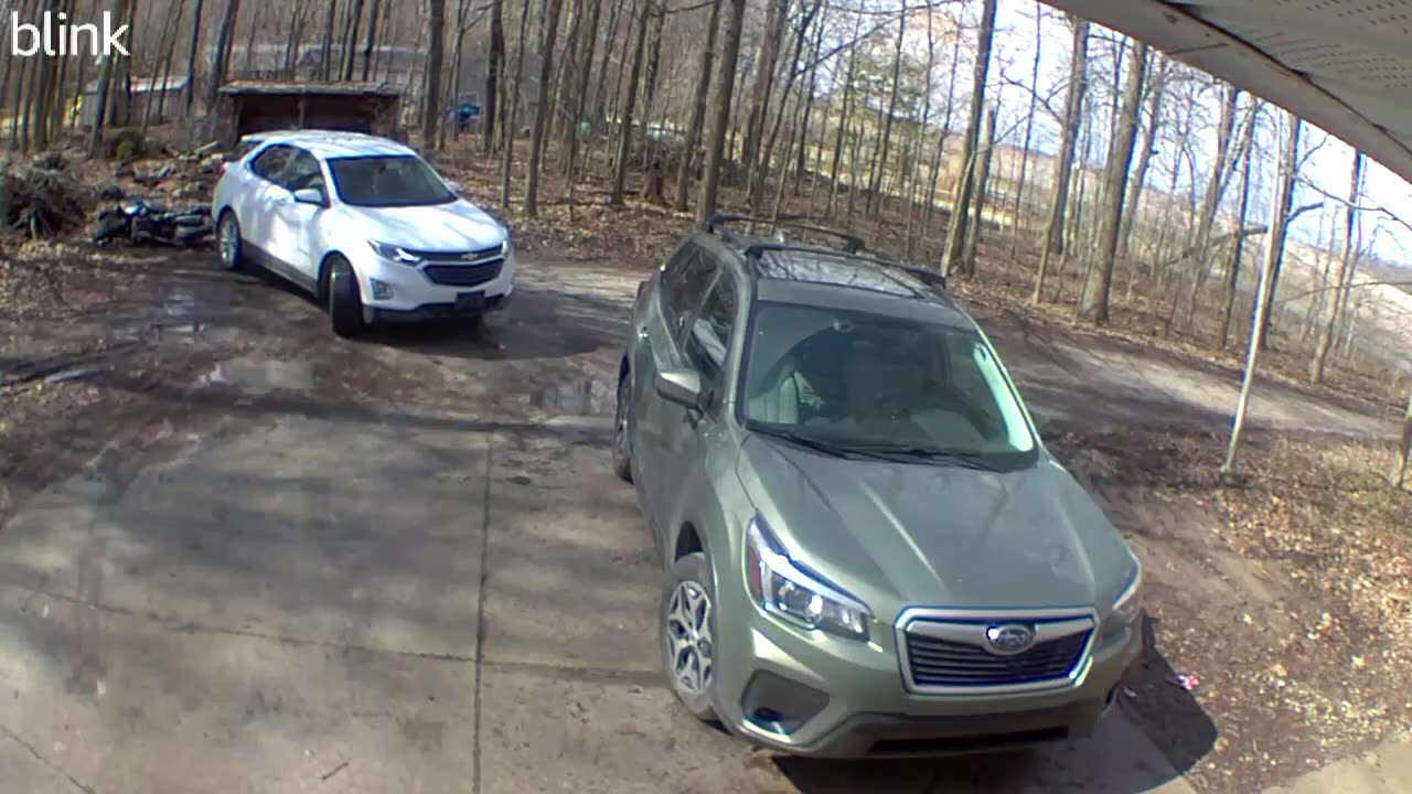 Reversing Car Backs Into Parked Motorcycle