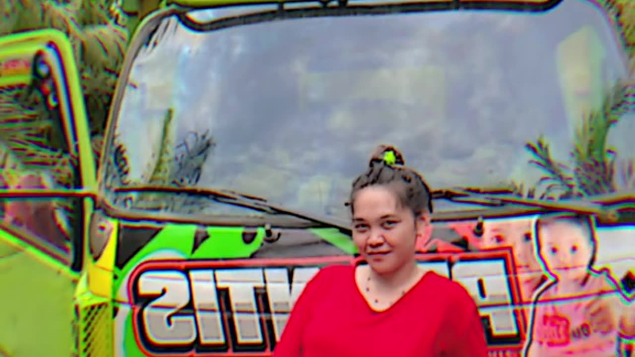 the skills of a female truck driver carrying a load of palm oil on a slippery road