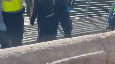 Dublin An African is being arrested and a local has a very witty question.