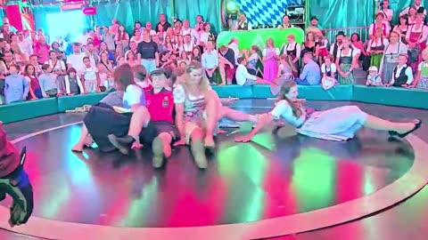 Young Girls Spin Slip Laugh on the Devils Wheel