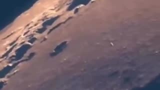 UFO Spotted Exiting the Moon?