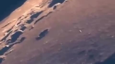 UFO Spotted Exiting the Moon?