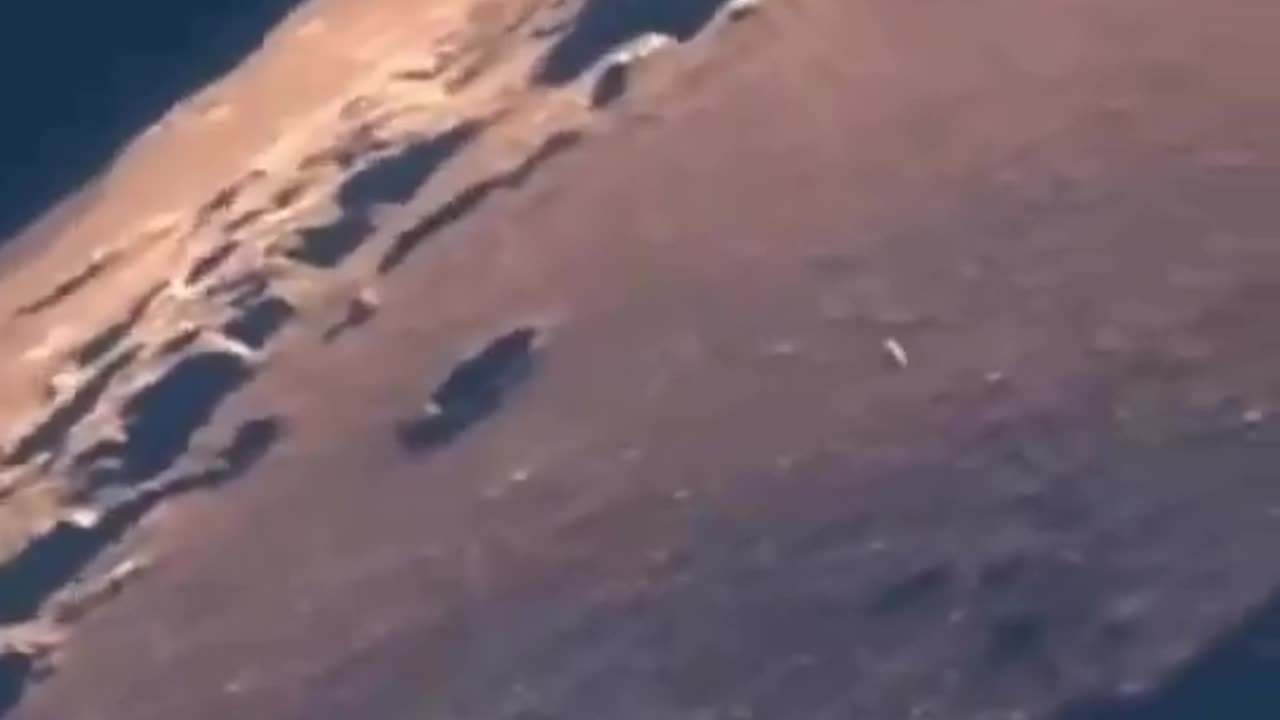 UFO Spotted Exiting the Moon?