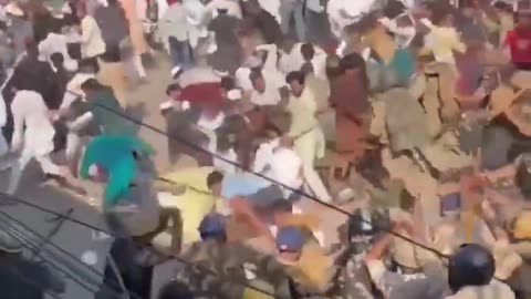 Police in India clear away violent Muslim mob.