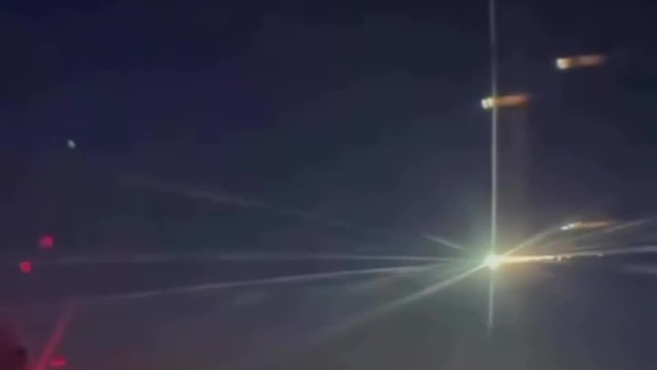 A flight attendant captures a meteor shower