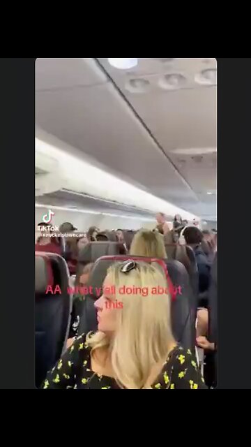 Part 1 of Lady wants off the plane because "that mother****er back there ain't real" Reptilian?