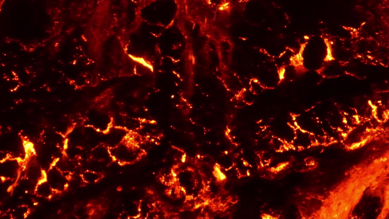 Mount Etna Lava Flow Advances Slowly Through Snow
