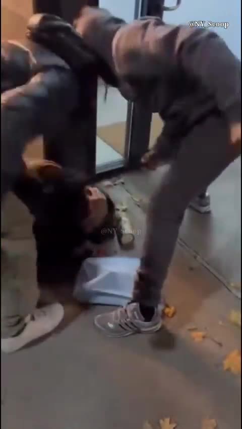 Serial spitter Anthony Caines on the receiving end of some “street-style justice.”