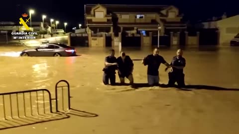 Police rescue people trapped in cars after Storm Alice hits Spain