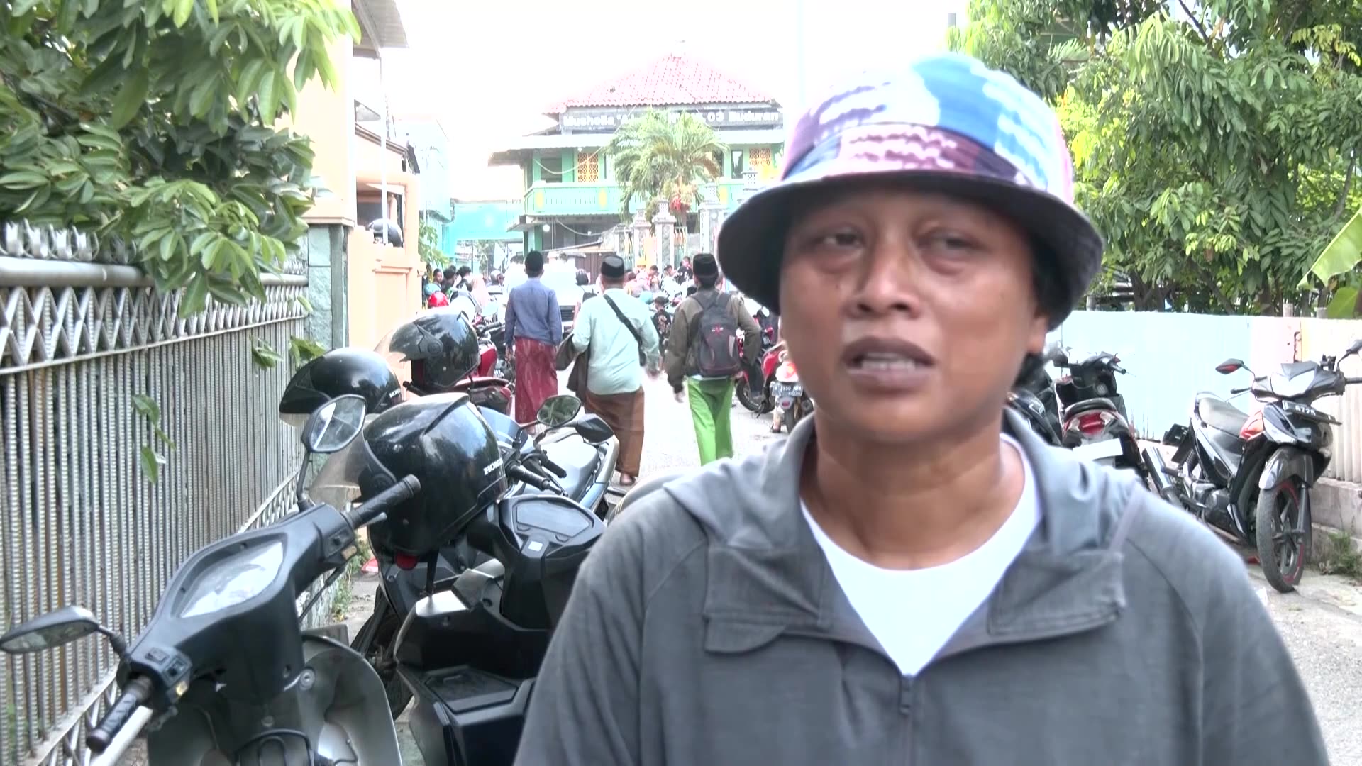 Hope dims for mother of son missing in Indonesia school collapse