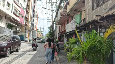 Follow The Ladies on A. Rivera Street in Manila City in the Philippines