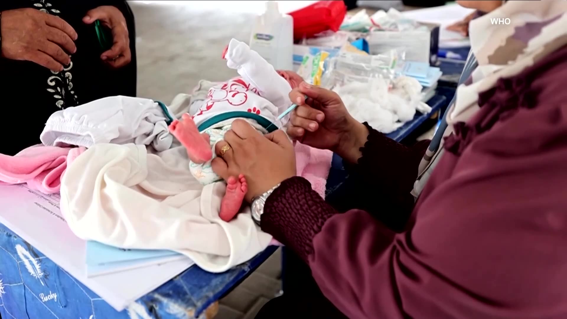 Gaza families bring kids for vaccination at catch-up campaign