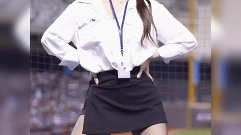 Beautiful and attractive Korean female cheerleader stands out on stage