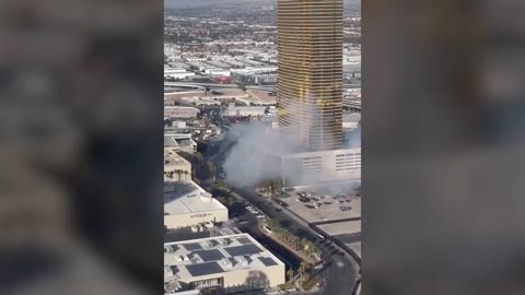 Smoke spotted outside of Trump hotel in Las Vegas, people seen evacuating