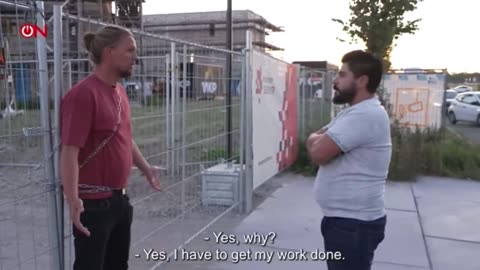 Concerned father chains himself to the construction site of a new center for feral invaders