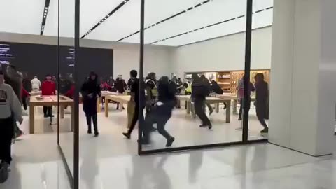 Usual suspects attack and rob a Apple Store in London and no one stops them.