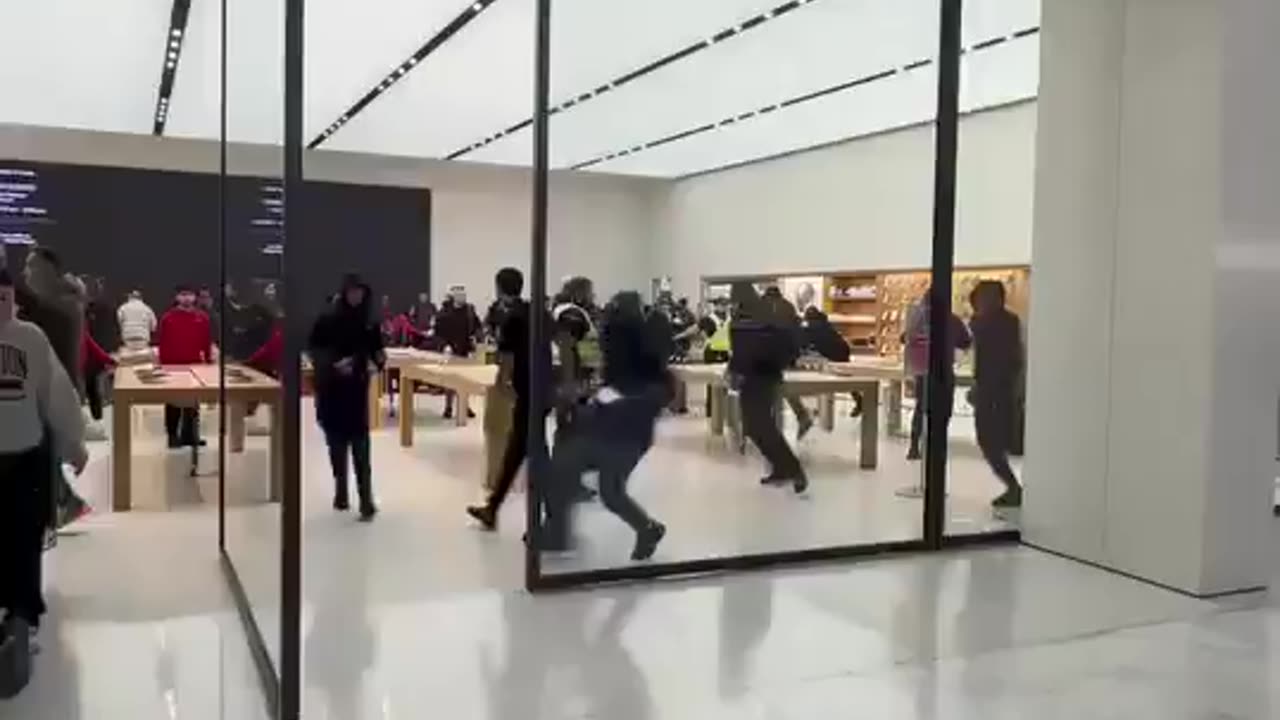 Usual suspects attack and rob a Apple Store in London and no one stops them.