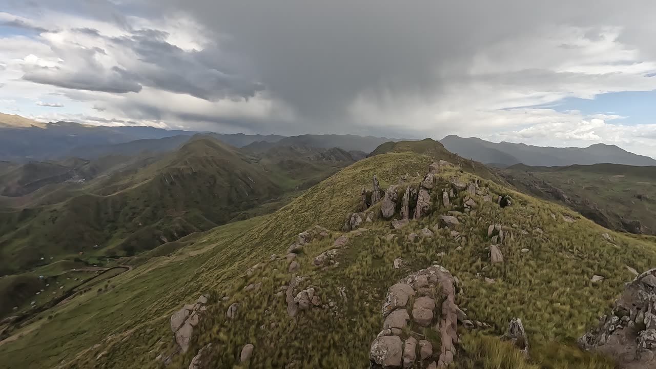 On the brink of a storm in a Cusco mountain peak