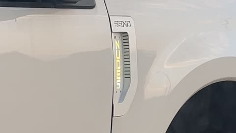 Truck's Custom Badge Encourages Photographers