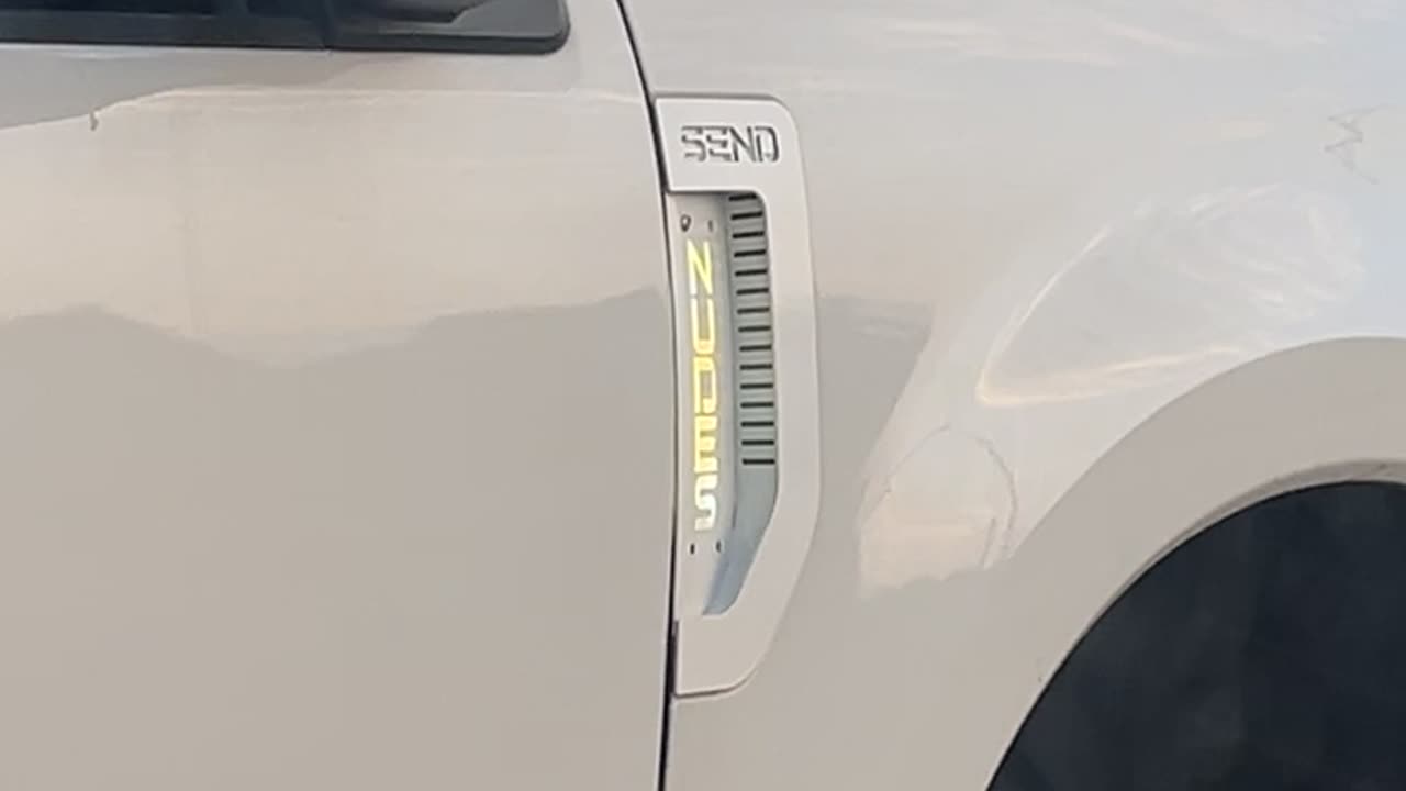 Truck's Custom Badge Encourages Photographers