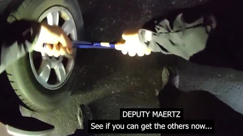 Police Help Man Change Frozen Tire... in Florida!