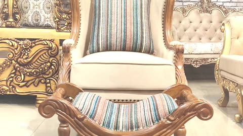 Royal chair design with a resting table in teak wood in natural PU finish |