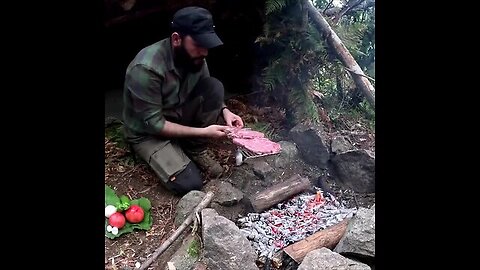 primitive survival shelter build and wilderness cooking in the forest