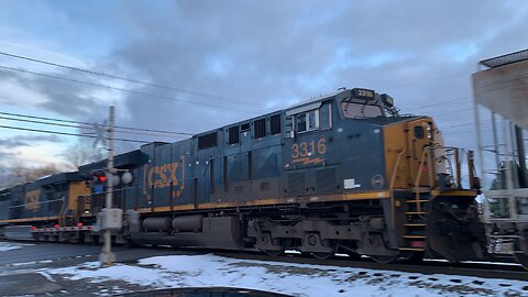 CSX Engines 5492 and 3316 head East with another Train in waiting