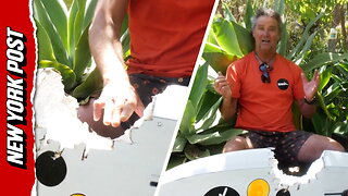 The terrifying moment an Australian windsurfer gets pulled underwater by a shark