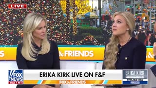 Phony Erika Kirk with more Gold on her fingers than Fort Knox