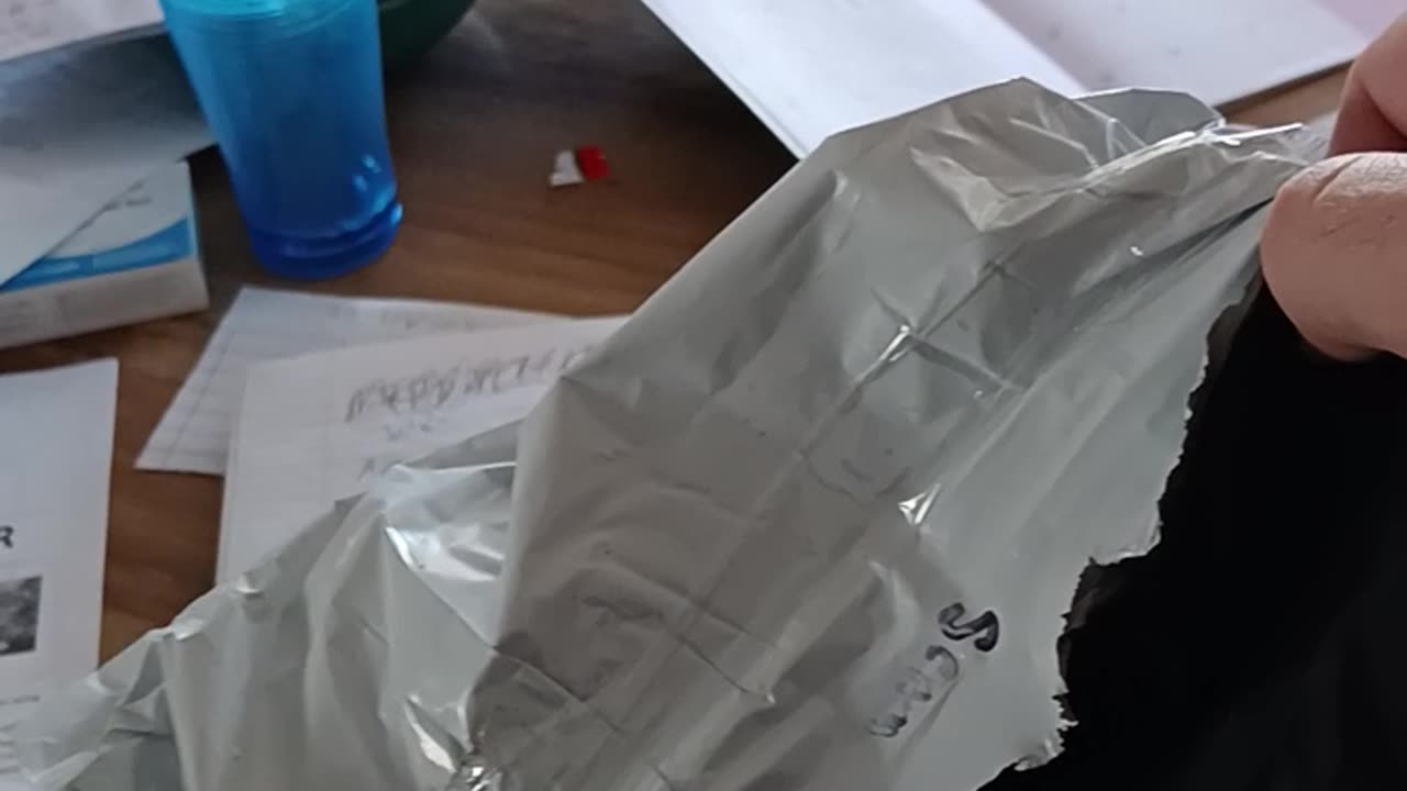 TO WHO EVER SENT ME THE CAM I WANTED..... YOU USED WAAAYY TOOO MUCH TAPE!!!!!