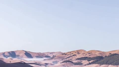 Soft Sunrise Timelapse Over Misty Mountain Valley | Relaxing Nature Scenery