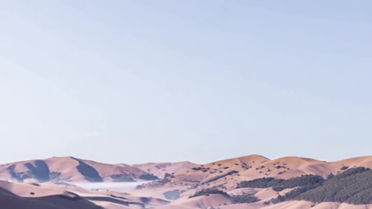 Soft Sunrise Timelapse Over Misty Mountain Valley | Relaxing Nature Scenery