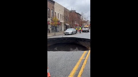 Massive road sinkhole