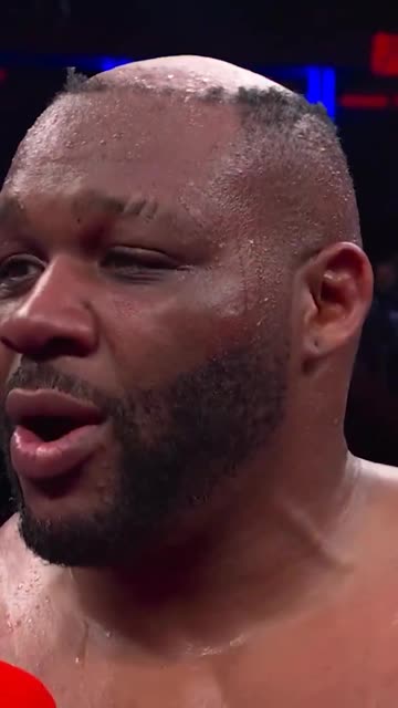 Jarrell Miller reacts to losing his hair during his win over Kingsley Ibeh