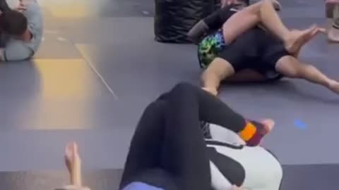 Girl getting her foot tickled in submission