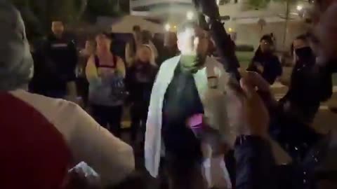 Anti ICE militant throws urine on a conservative