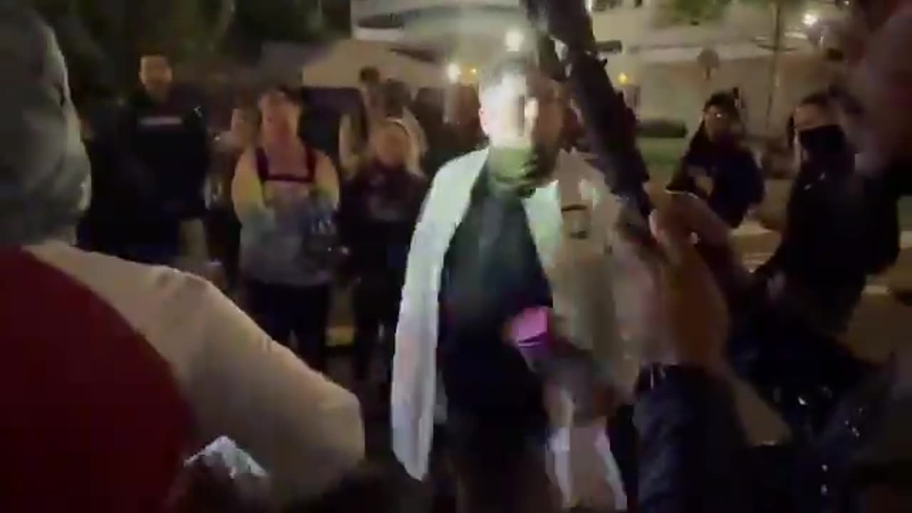 Anti ICE militant throws urine on a conservative