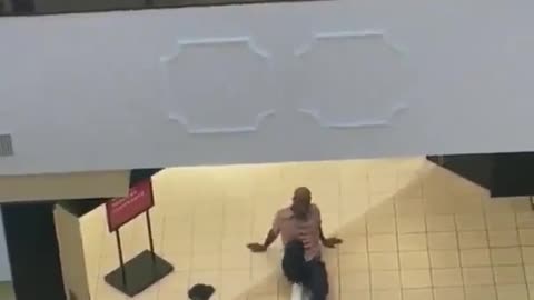 Dude jumps off 2nd floor trying to get away