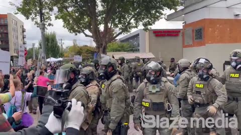BREAKING: Federal agents just stormed out of the ICE facility in Portland