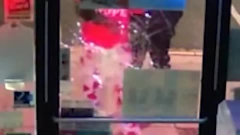 Man Smashes Vape Shop Door with Concrete Rock
