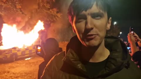 Police and protesters clash outside Dublin hotel...