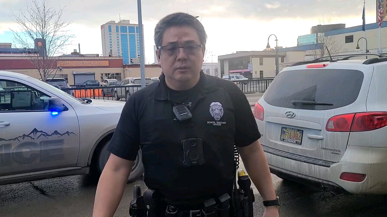COP SEARCHES VEICHLE