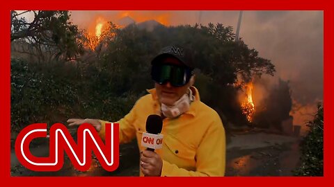 ‘Out of control’: CNN reporter on scene describes Los Angeles wildfire conditions