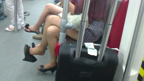 Subway nylon dangling of wedge heels...