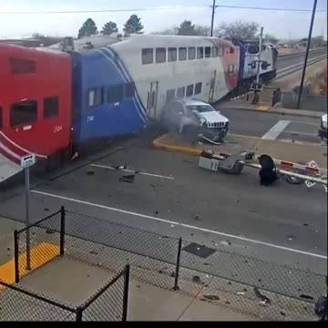 Utah driver jumps out of his SUV seconds before a train slams into it