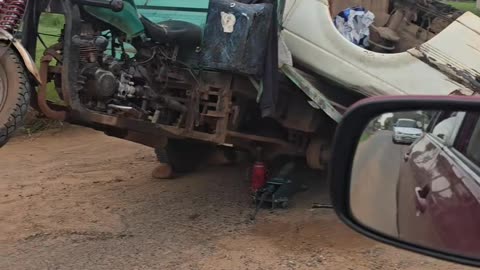 Drunk Motorcyclist Towing a Car