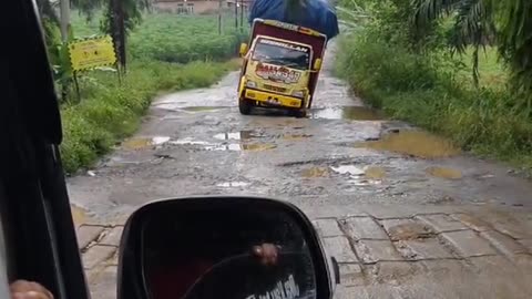 The truck swayed again due to the potholes in the road