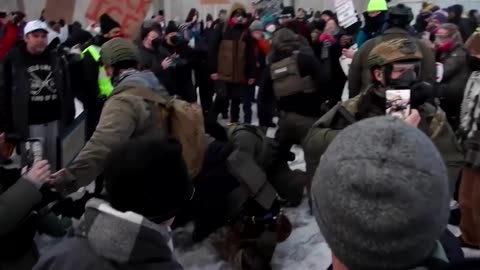 Protesters, ICE agents scuffle day after fatal shooting in Minnesota